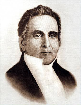A portrait of Sidney Rigdon. He wears a dark coat and white shirt with the collar up. His face is somewhat round. He has dark hair.